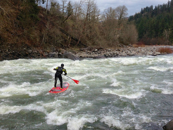 white water paddle boarding