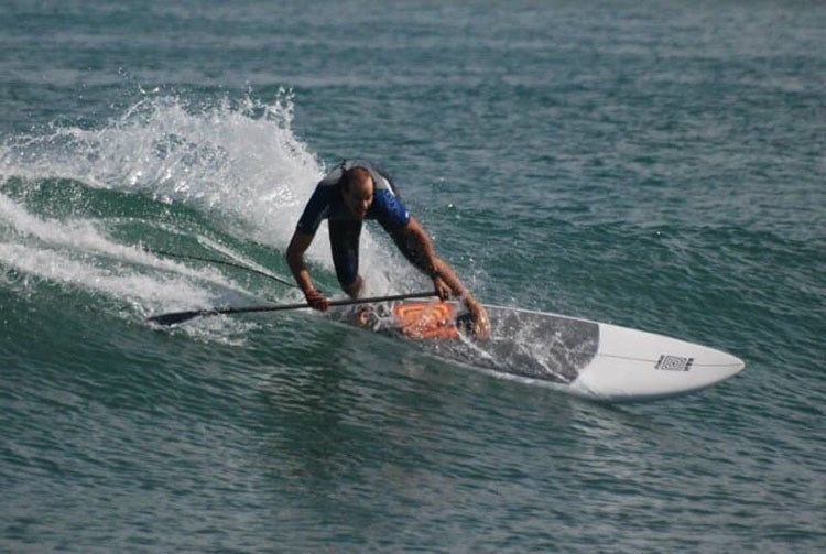 paddle board surfing